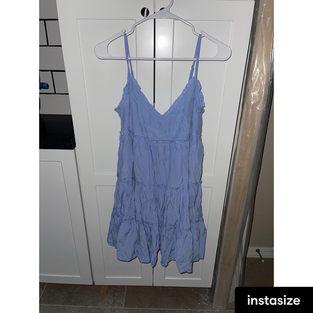 Entro sleeveless ruffle dress.